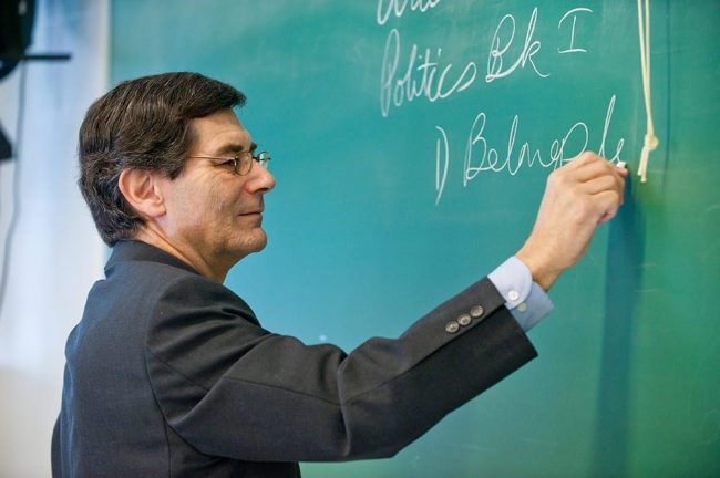 Dr. Healy Using Chalkboard